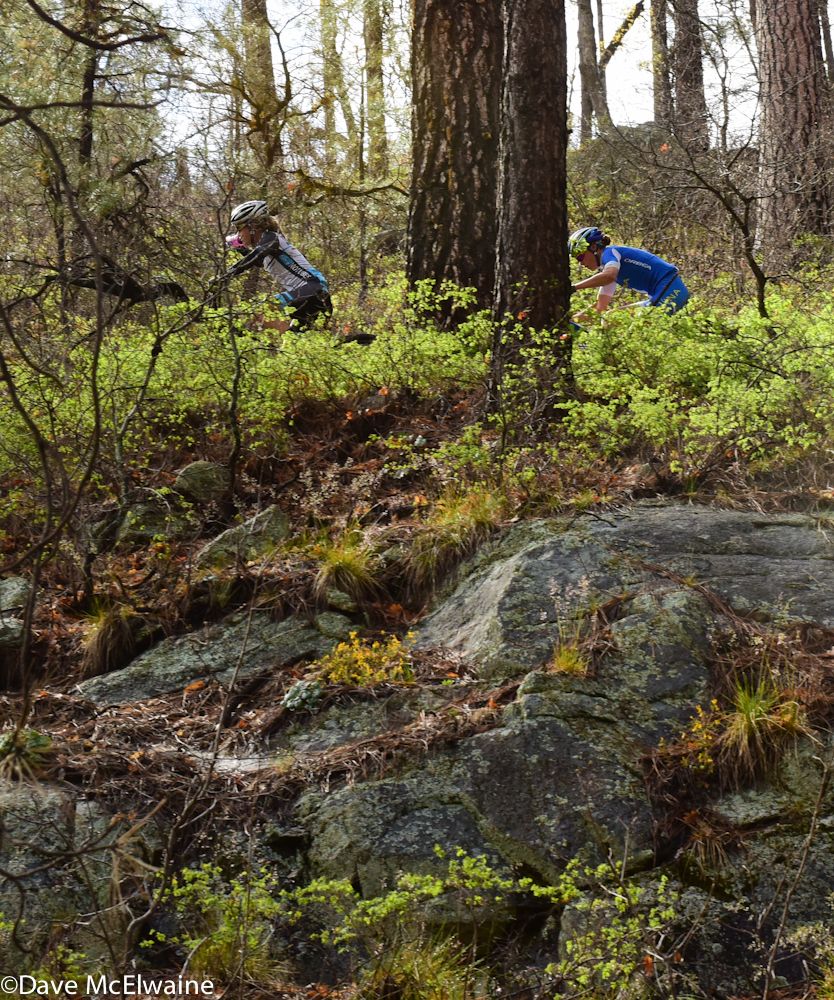 Chloe Woodruff (NoTubes Niner) and Georgia Gould climbing switchbacks