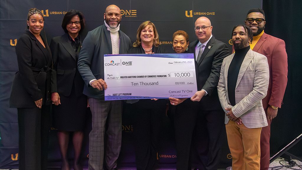 Comcast and TV One awarded $10,000 to Hartford, Connecticut, organization Hart Lift during a Black History Month watch party for TV One&rsquo;s Urban One Honors (l. to r.): Camille Thelemaque-Bearden, TV One; Adrienne Cochrane, CEO, YWCA Hartford Region; Connecticut Sen. Douglas McCrory; Carolyne Hannah, Comcast; LaTanya Butler, TV One; David Griggs, MetroHartford Alliance; Toi Thornton, anchor, NBC Connecticut; and Marcus Cook, TV One.