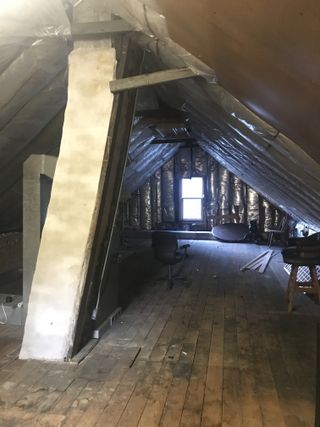 run down attic before refurbishment