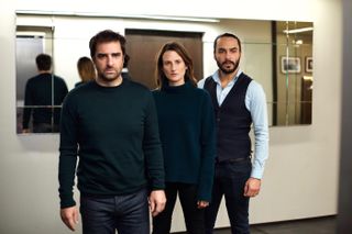 'Call My Agent!' star Camille Cottin stands with two men in front of a mirror