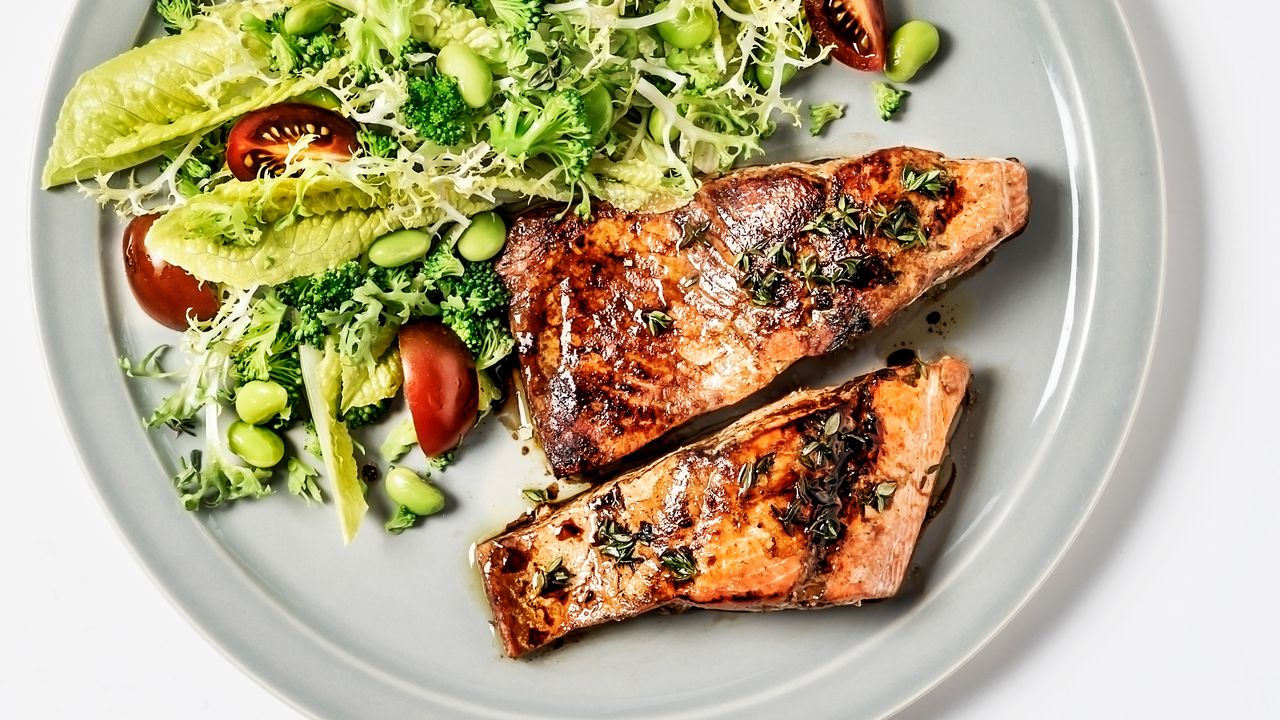 Salmon and salad, part of a Mediterranean diet