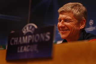 Arsene Wenger smiles during a Champions League press conference with Arsenal