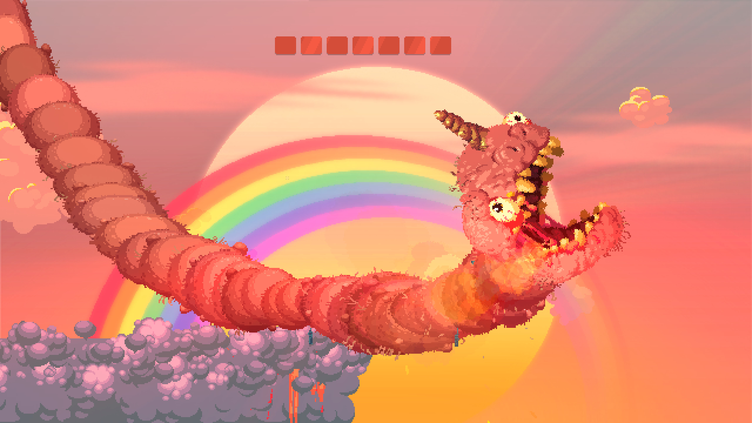 Ett enormt maskliknande monster med ett enhörningshorn visas framför en regnbåge Nidhogg 2.