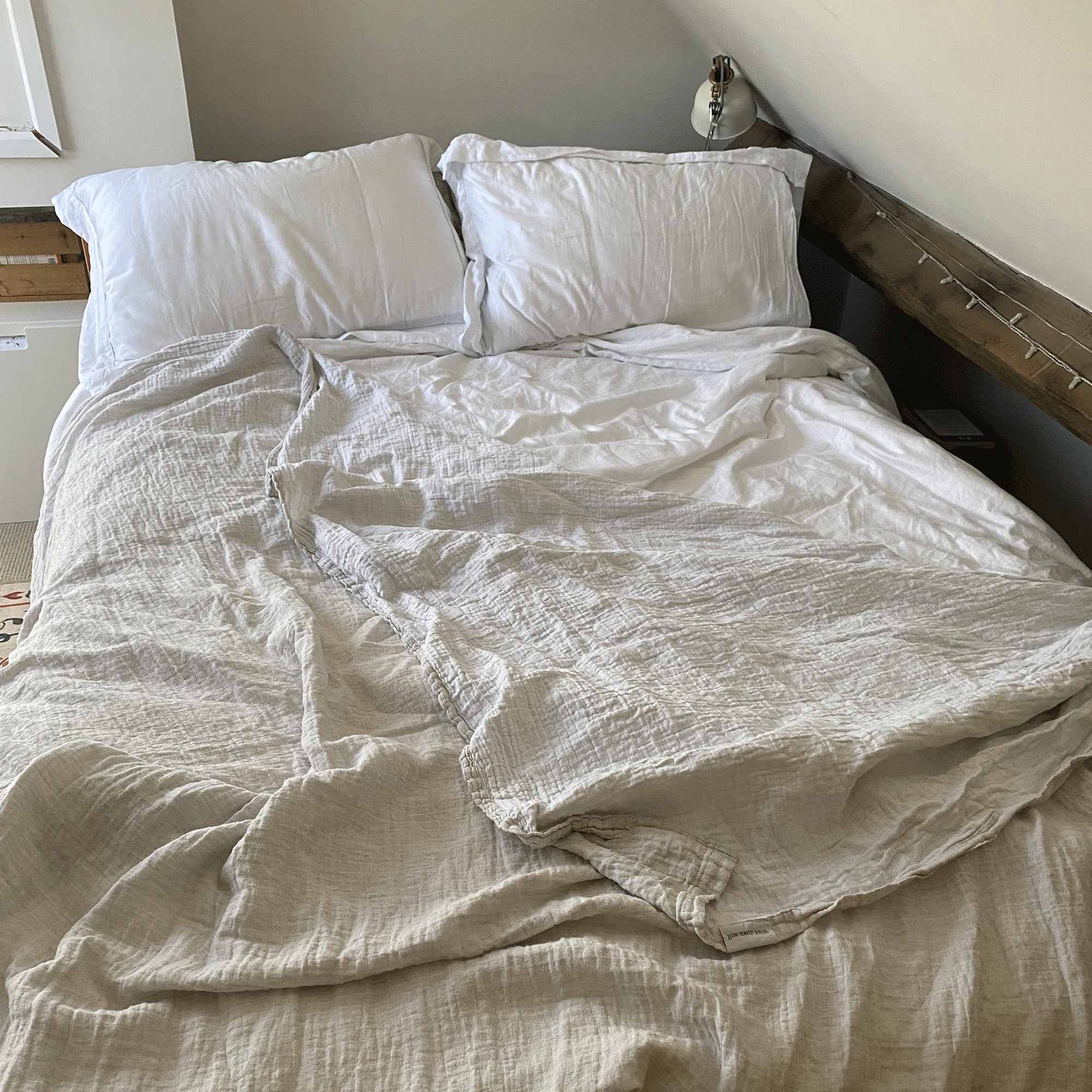 Bedfolks linen throw on white bedding