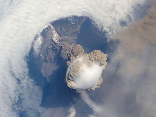Cloud on top of a volcano plume.
