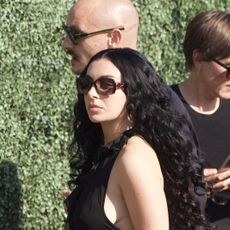 Charli XCX wears a little black dress to attend Matty Healy and fianc&eacute;e Gabbriette Bechtel's wedding in Los Angeles