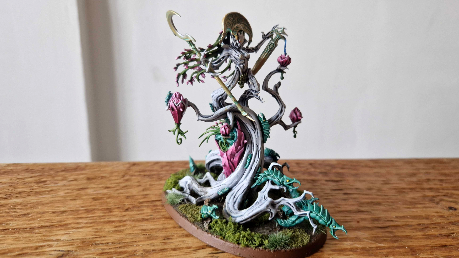 Warhammer Sylvaneth Grove Guardian model on a wooden table, against a plain background