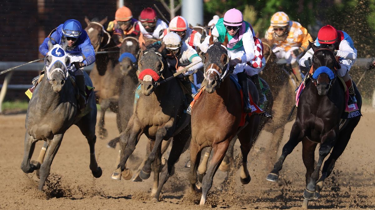 The running of the Kentucky Derby at Churchill Downs