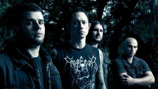 Trivium posing for a photograph in 2013