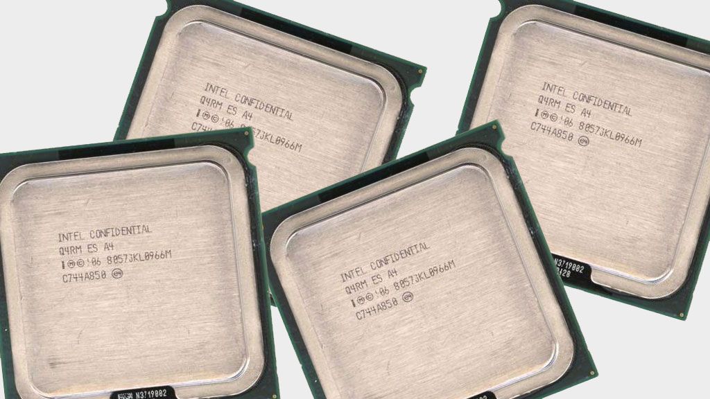 Several Intel Engineering Sample (ES) CPUs on a gray background.