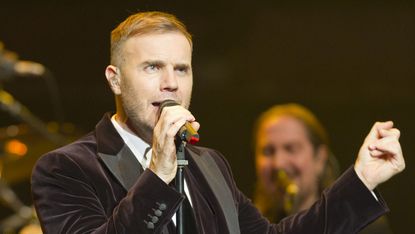 LONDON, ENGLAND - DECEMBER 06:Gary Barlow performs at a concert in support of The Prince's Trust and The Foundation of Prince William and Prince Harry at the Royal Albert Hall on December 6, 