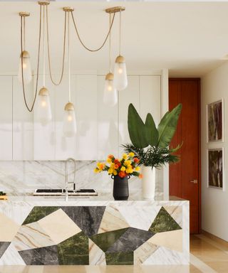 Martyn Lawrence Bullard Los Cabos kitchen with statement marble island and pendant light