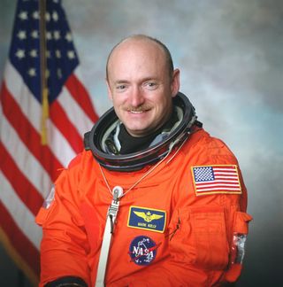 Astronaut Mark E. Kelly, commander of STS-124, poses for a preflight photo. 