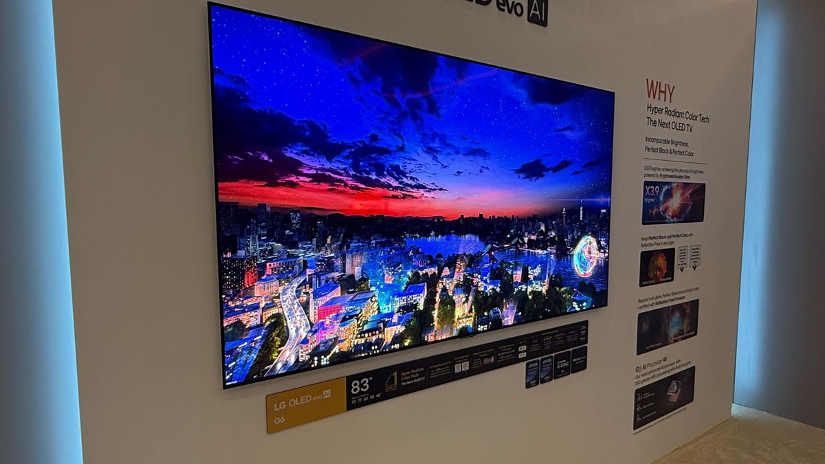 A wall mounted LG G6 OLED TV with LG demo content on screen