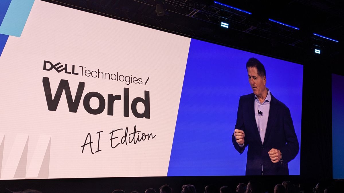 Michael Dell onstage at Dell Technologies World 2024, next to a large logo for the conference with the words &#039;AI edition&#039; attached.