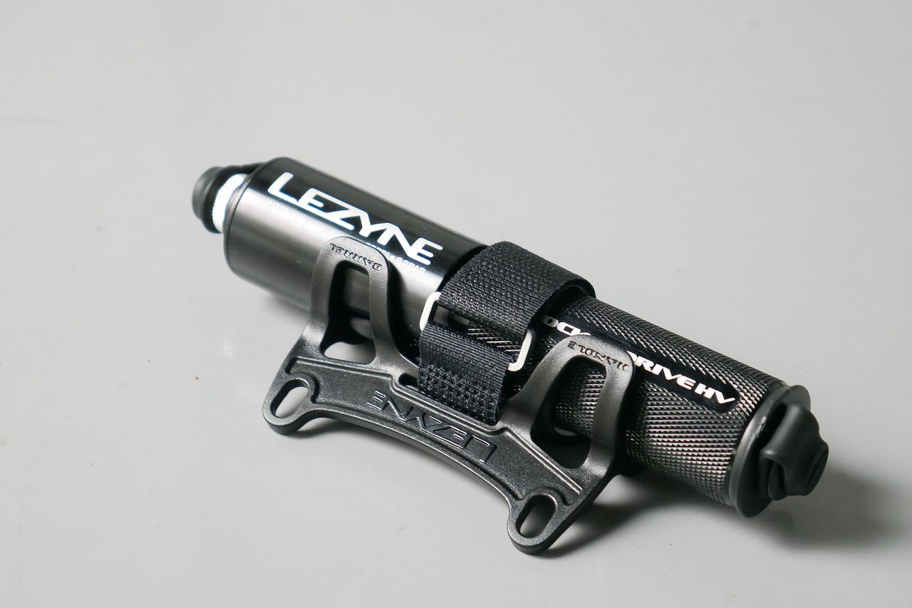 Best bike mini pumps group test 2026 - Lezyne Pocket Drive in its most compact form attached to its bottle cage mount