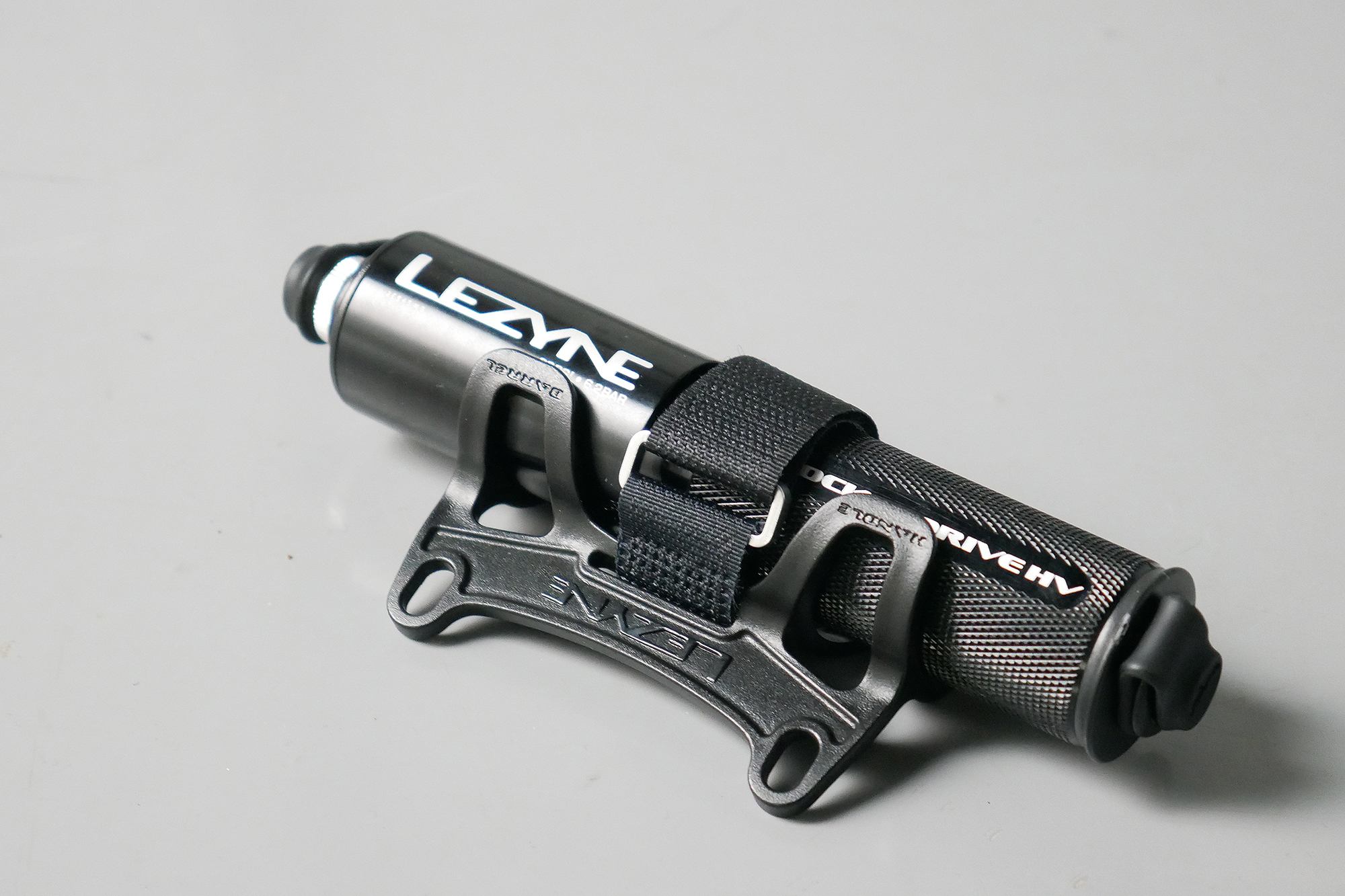 Best bike mini pumps group test 2026 - Lezyne Pocket Drive in its most compact form attached to its bottle cage mount