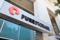 Low-angle view of sign with logo on facade of technology company Pure Storage in the Silicon Valley town of Mountain View, California