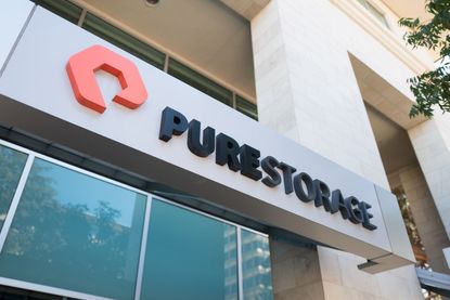 Low-angle view of sign with logo on facade of technology company Pure Storage in the Silicon Valley town of Mountain View, California