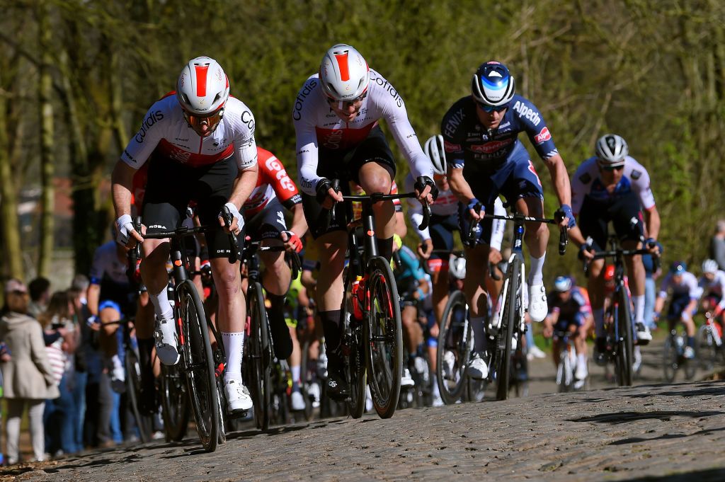 KOKSIJDE BELGIUM MARCH 18 LR Piet Allegaert of Belgium and Max Walscheid of Germany and Team Cofidis compete through cobblestones sector during the 20th Bredene Koksijde Classic 2022 a 2009km one day race from Bredene to Koksijde bredenekoksijde on March 18 2022 in Koksijde Belgium Photo by Luc ClaessenGetty Images