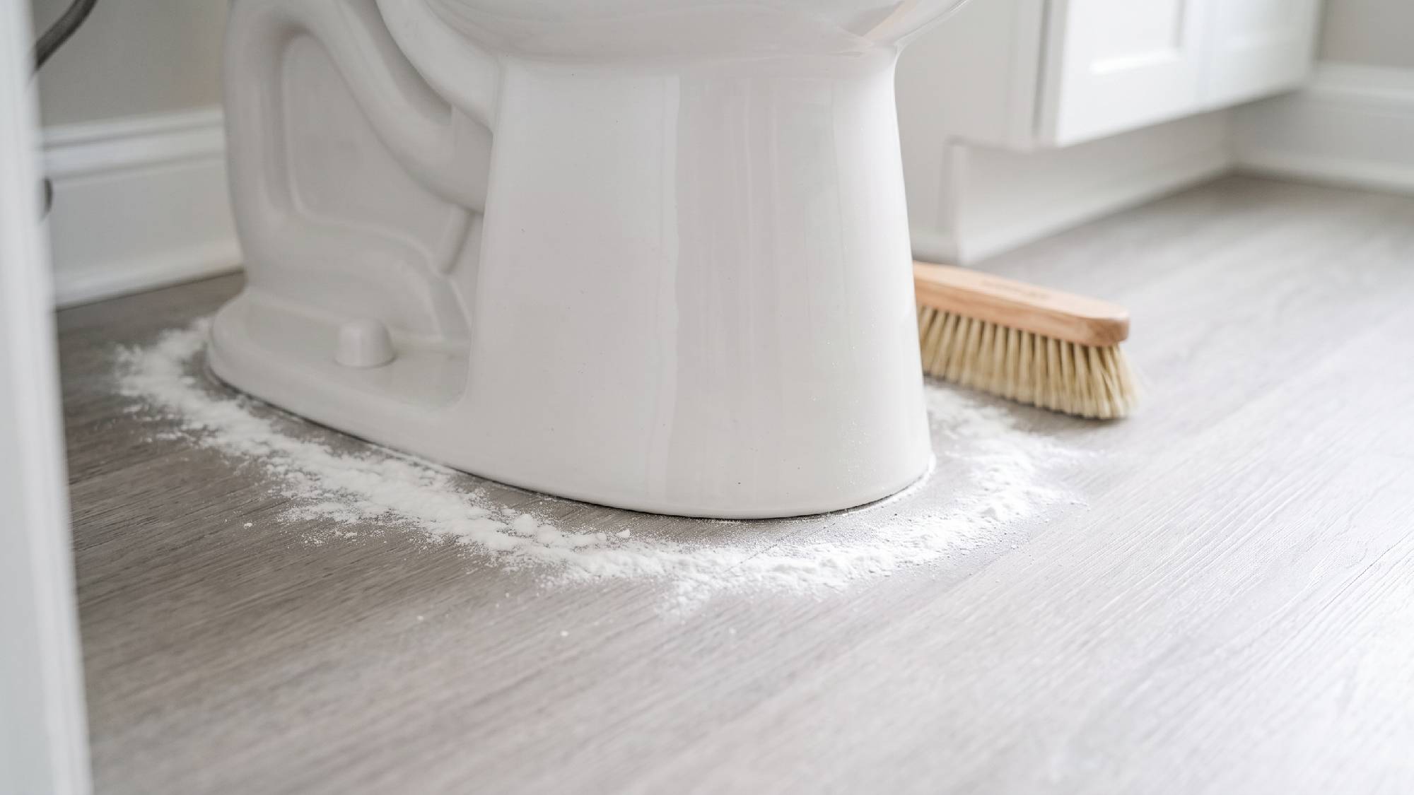 Baking soda ring around toilet base to neutralize odors 