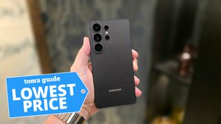 Samsung Galaxy S26 Ultra in hand with Tom's Guide 'Lowest Price' badge overlaid