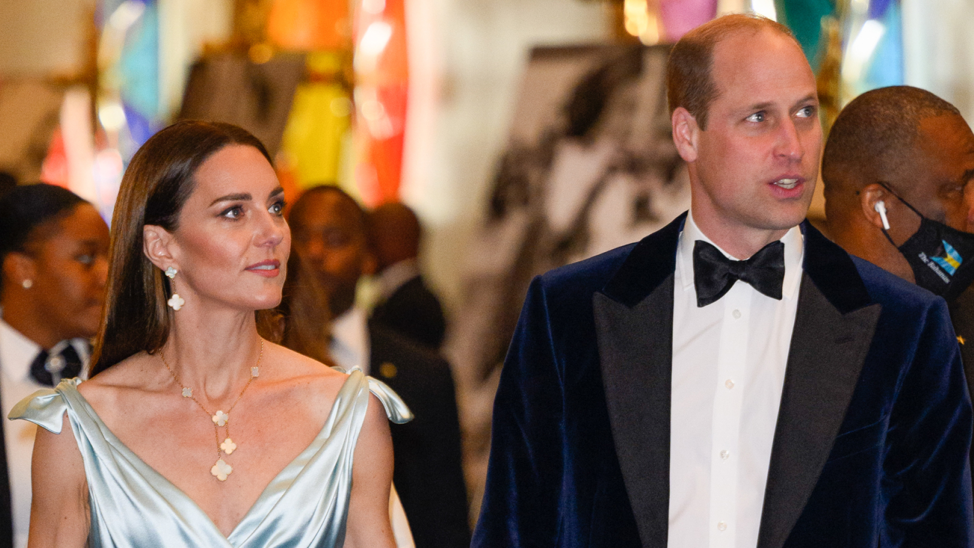 Kate Middleton wears a pale blue silk gown while Prince William wears a suit in 2022 