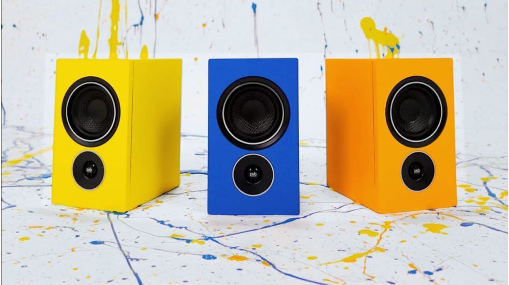 PSB Alpha iQ wireless speakers in various colors on white