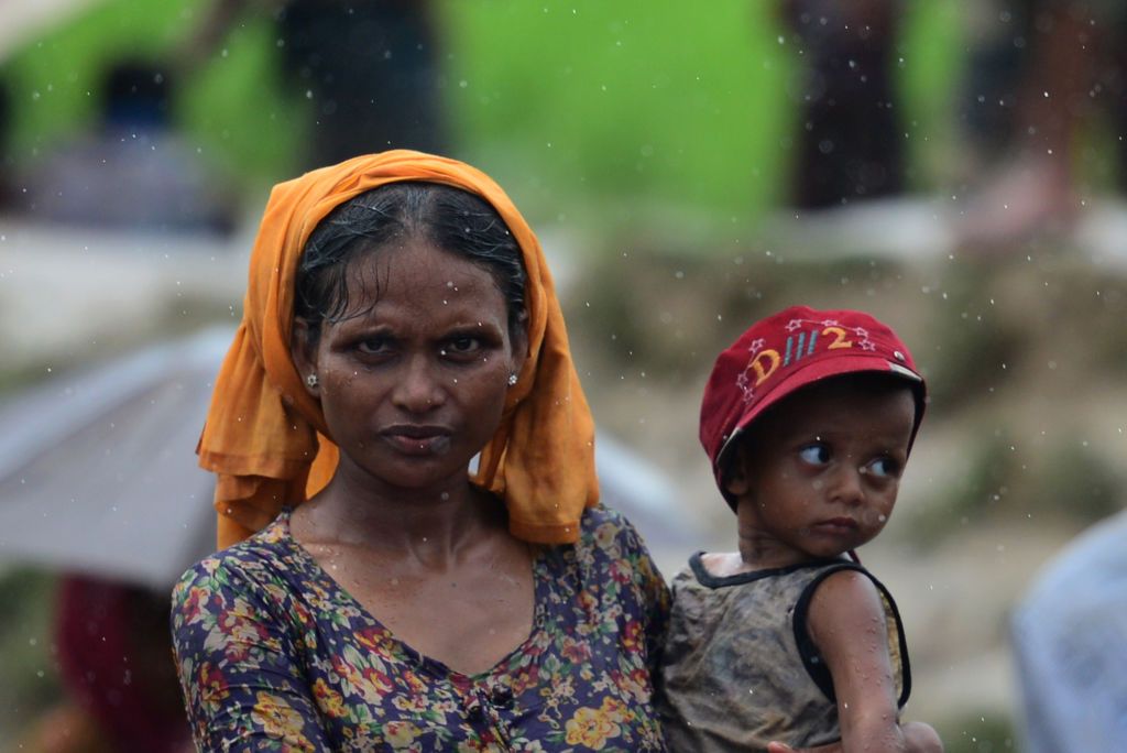 Rohingya refugees wait to enter the camps in Bangladesh.