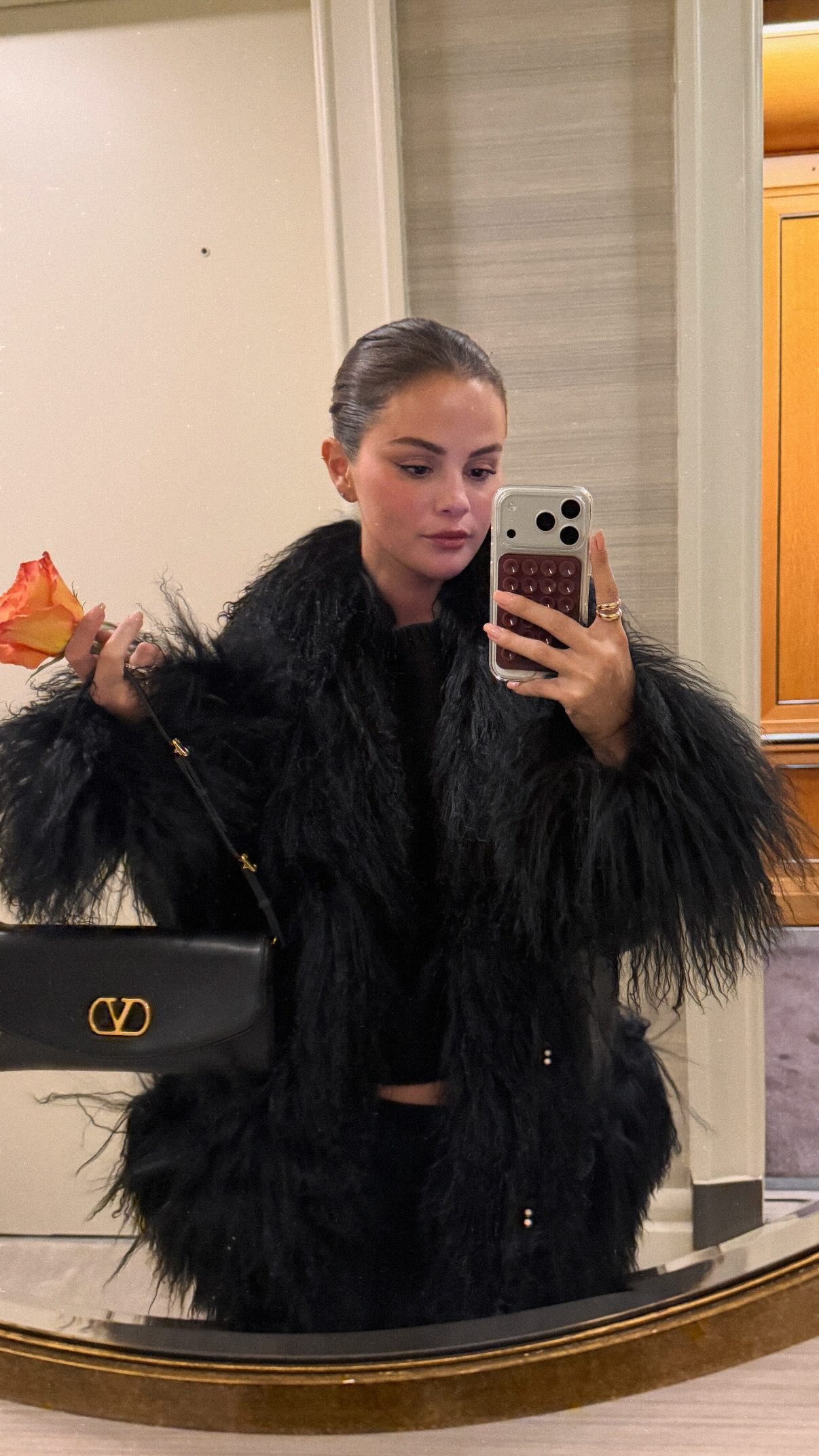 Selena Gomez styled two black, shearling-trimmed Penny Lane coats on Instagram