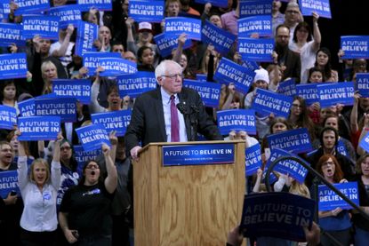 Bernie Sanders and his supporters during a rally.