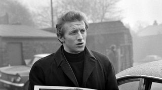 Manchester United player Denis Law arrives for training. February 1969. (Photo by Sheppard/Daily Mirror/Mirrorpix via Getty Images)