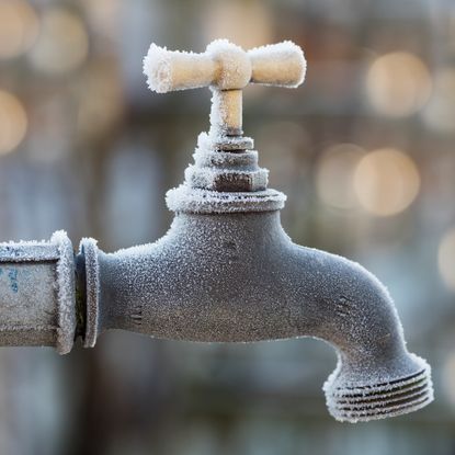 Frost on outdoor faucet or spigot on a winter morning