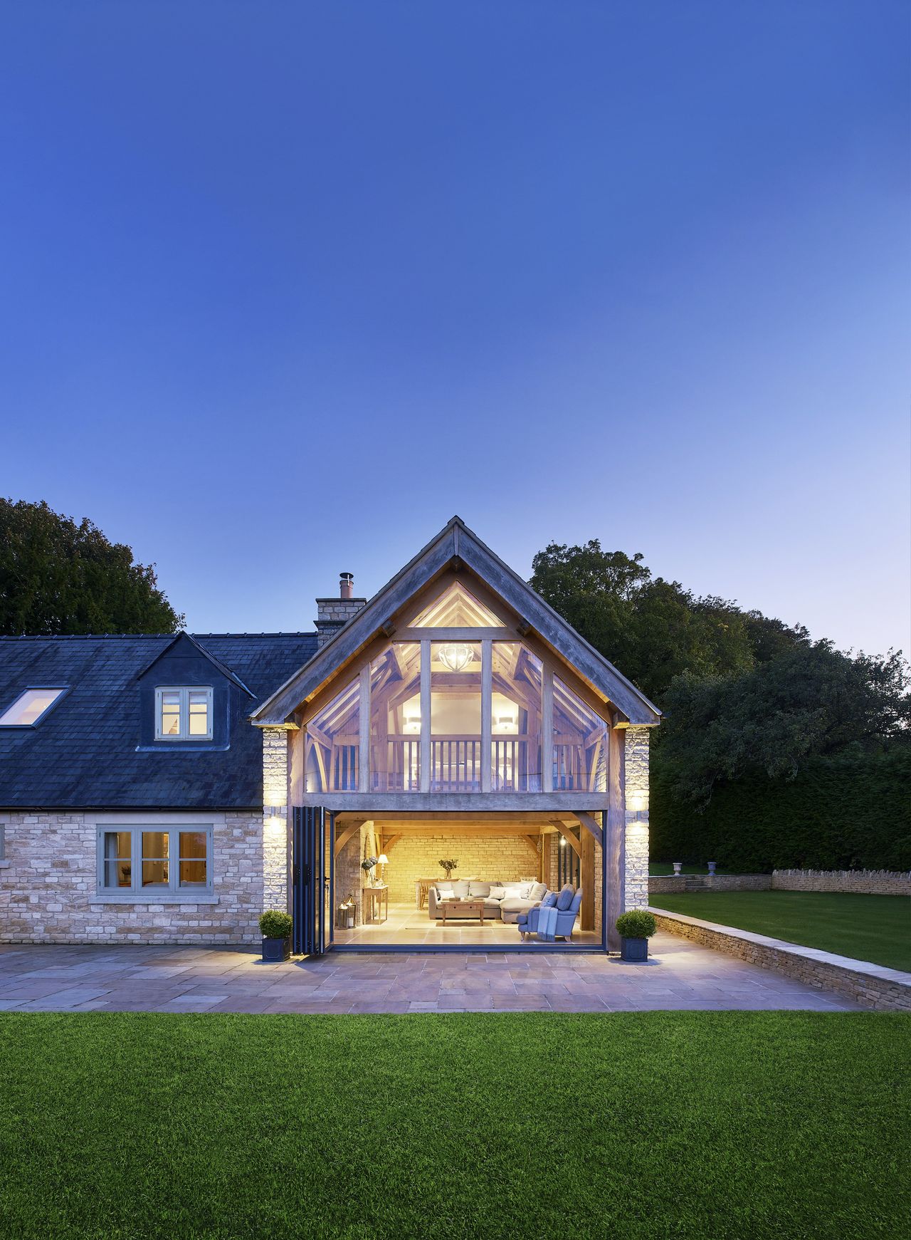 oak frame extension with living room and stone exterior