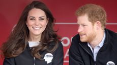 Catherine, Princess of Wales and Prince Harry smile ahead of signaling the start of the 2017 Virgin Money London Marathon on April 23, 2017 