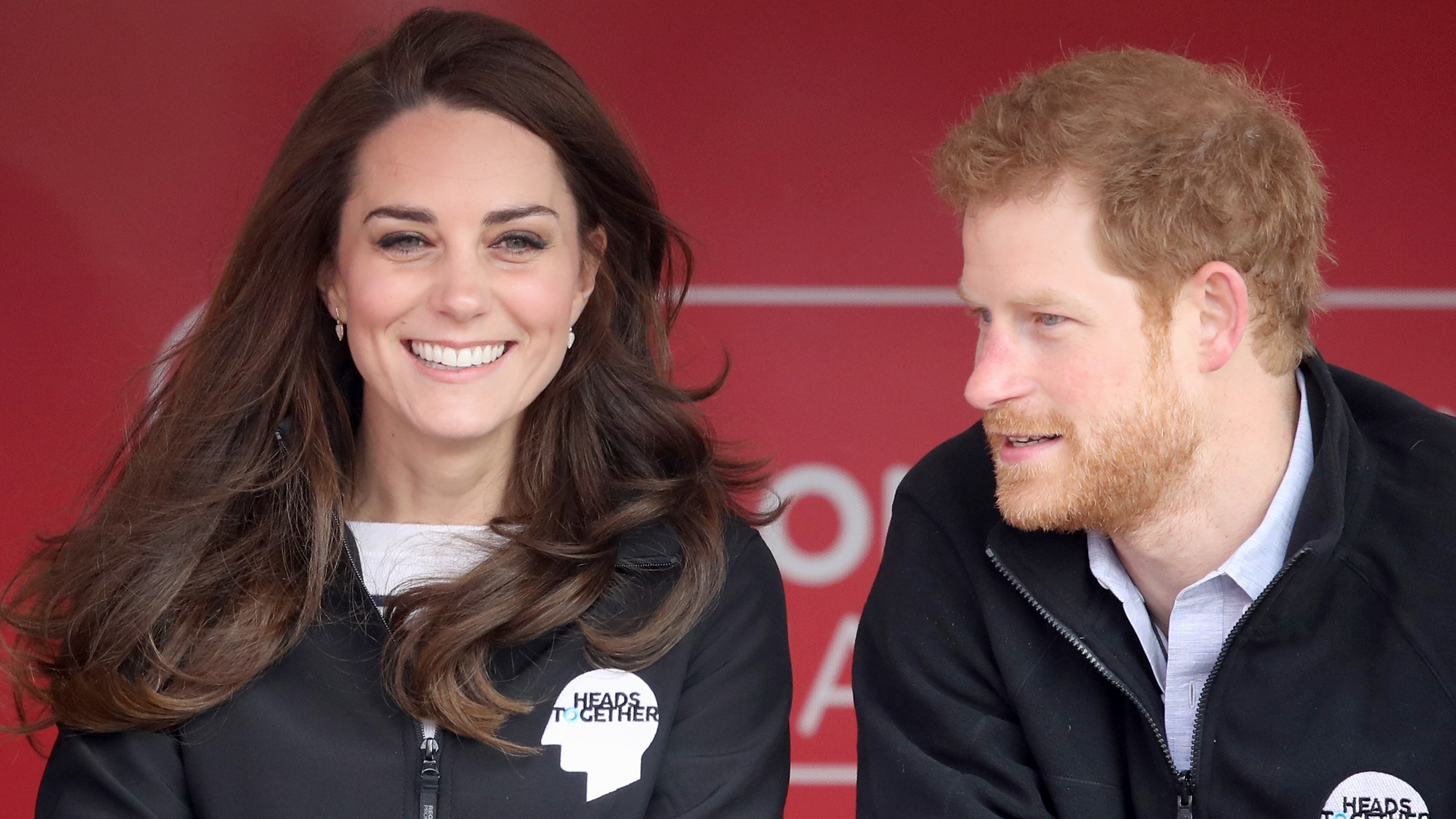 Catherine, Princess of Wales and Prince Harry smile ahead of signaling the start of the 2017 Virgin Money London Marathon on April 23, 2017 