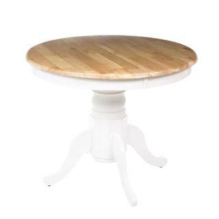 A round dining table with a light wood top with a white border and a white base with three curved legs