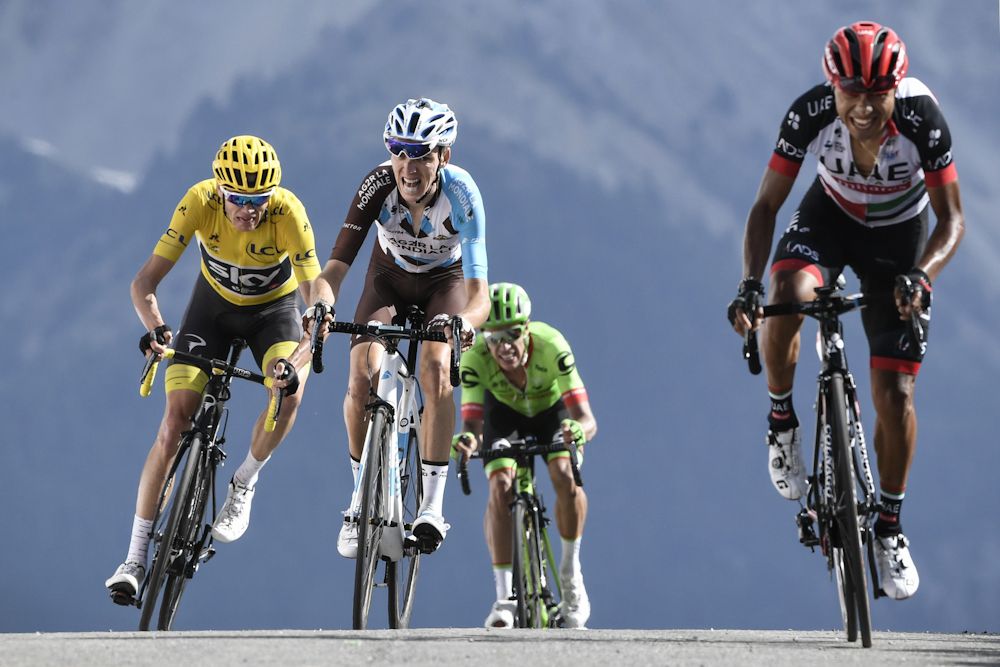 Darwin Atapuma takes second during stage 18 at the Tour de France ahead of Romain Bardet and Chris Froome