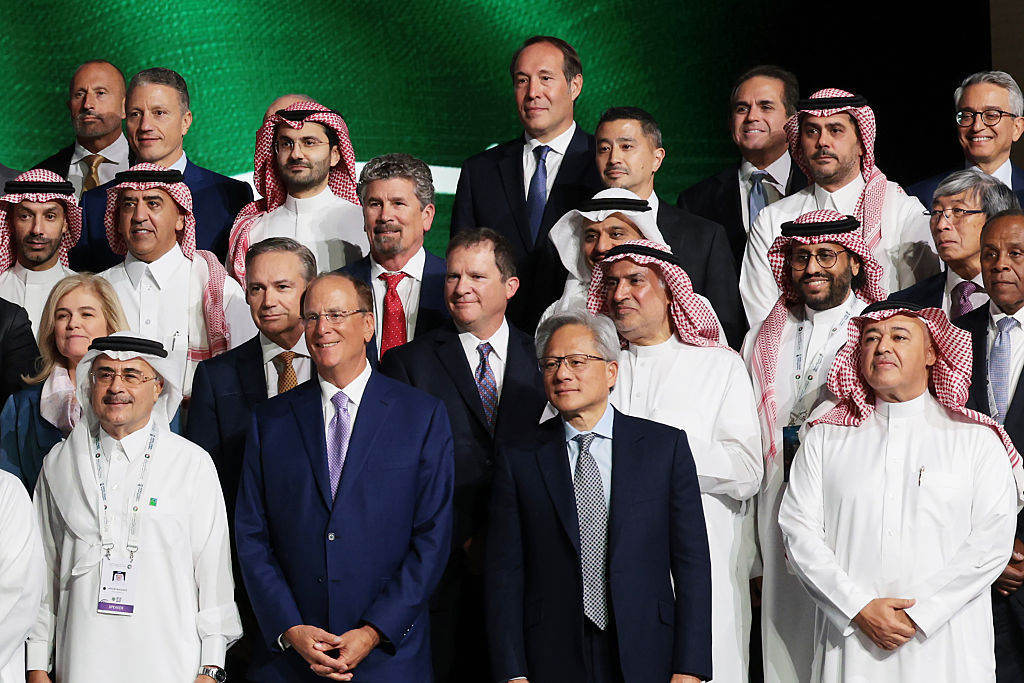 Nvidia CEO Jensen Huang (2nd R) pose for a photo with business leaders at the King Abdul Aziz International Conference Center while attending a Saudi-U.S. business investment forum on May 13, 2025, in Riyadh, Saudi Arabia