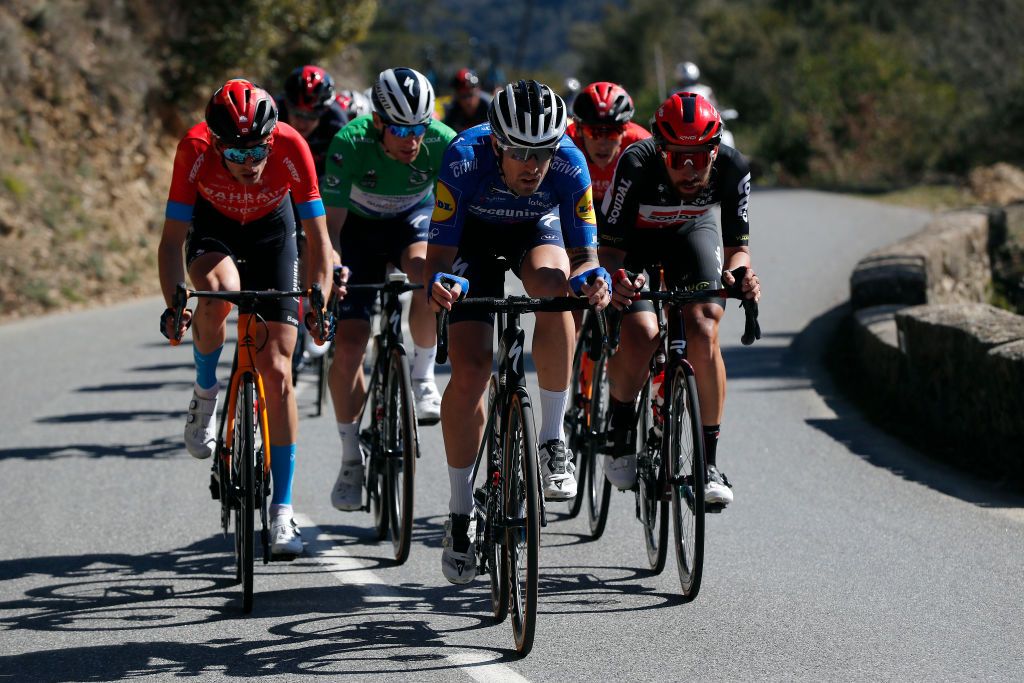 VALDEBLORE LA COLMIANE FRANCE MARCH 13 Gino Mader of Switzerland and Team Bahrain Victorious Sam Bennett of Ireland and Team Deceuninck QuickStep Green sprint jersey Mattia Cattaneo of Italy and Team Deceuninck QuickStep Thomas De Gendt of Belgium and Team Lotto Soudal during the 79th Paris Nice 2021 Stage 7 a 119km stage from Le Broc to Valdeblore La Colmiane 1501m Breakaway Stage itinerary redesigned due to COVID19 lockdown imposed in the city of Nice ParisNice on March 13 2021 in Valdeblore La Colmiane France Photo by Bas CzerwinskiGetty Images