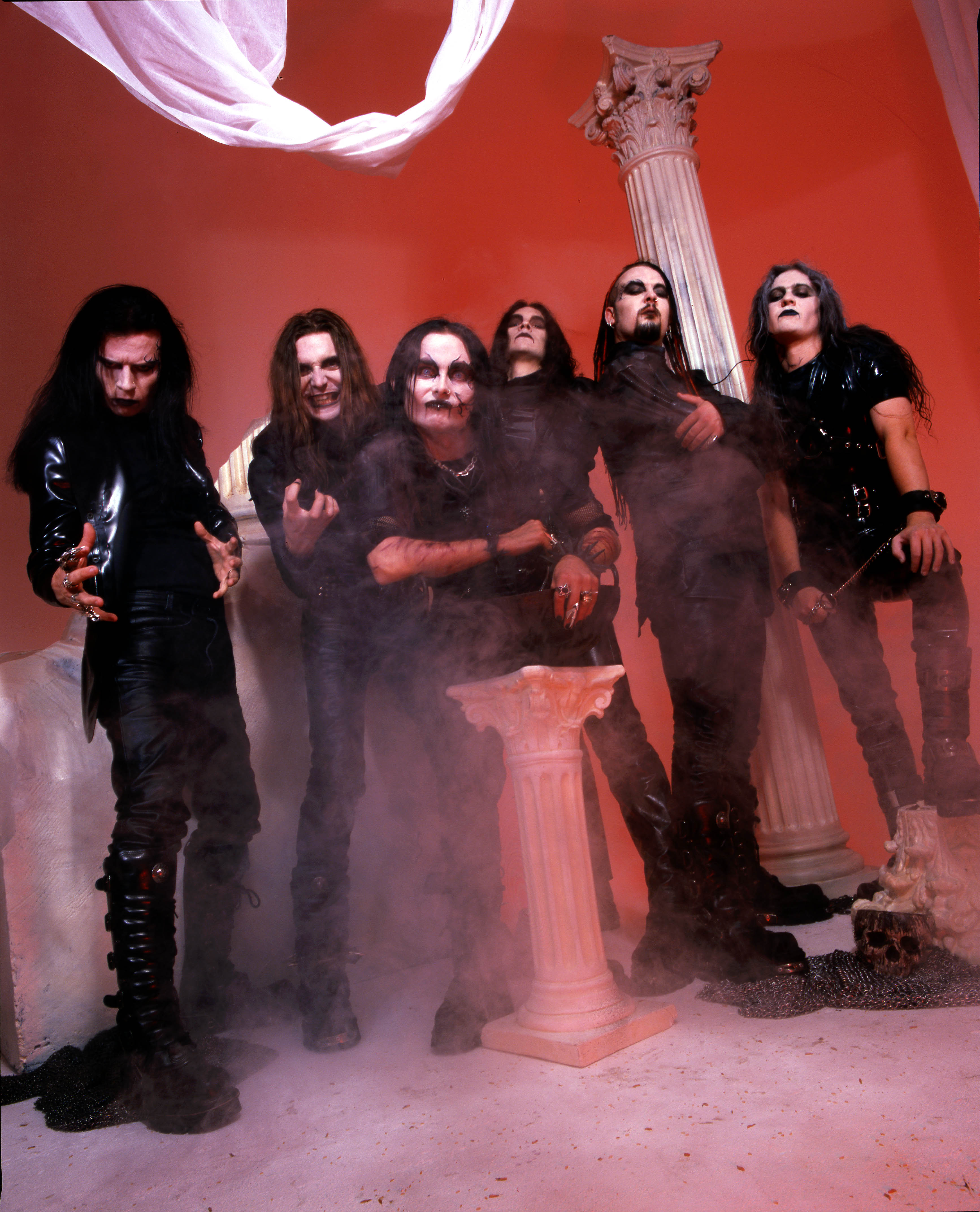 Cradle Of FIlth at an altar surrounded by fog