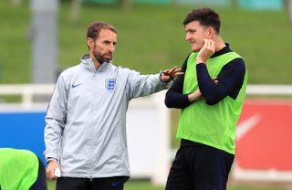 Gareth Southgate, left, has dropped Harry Maguire for the next two games