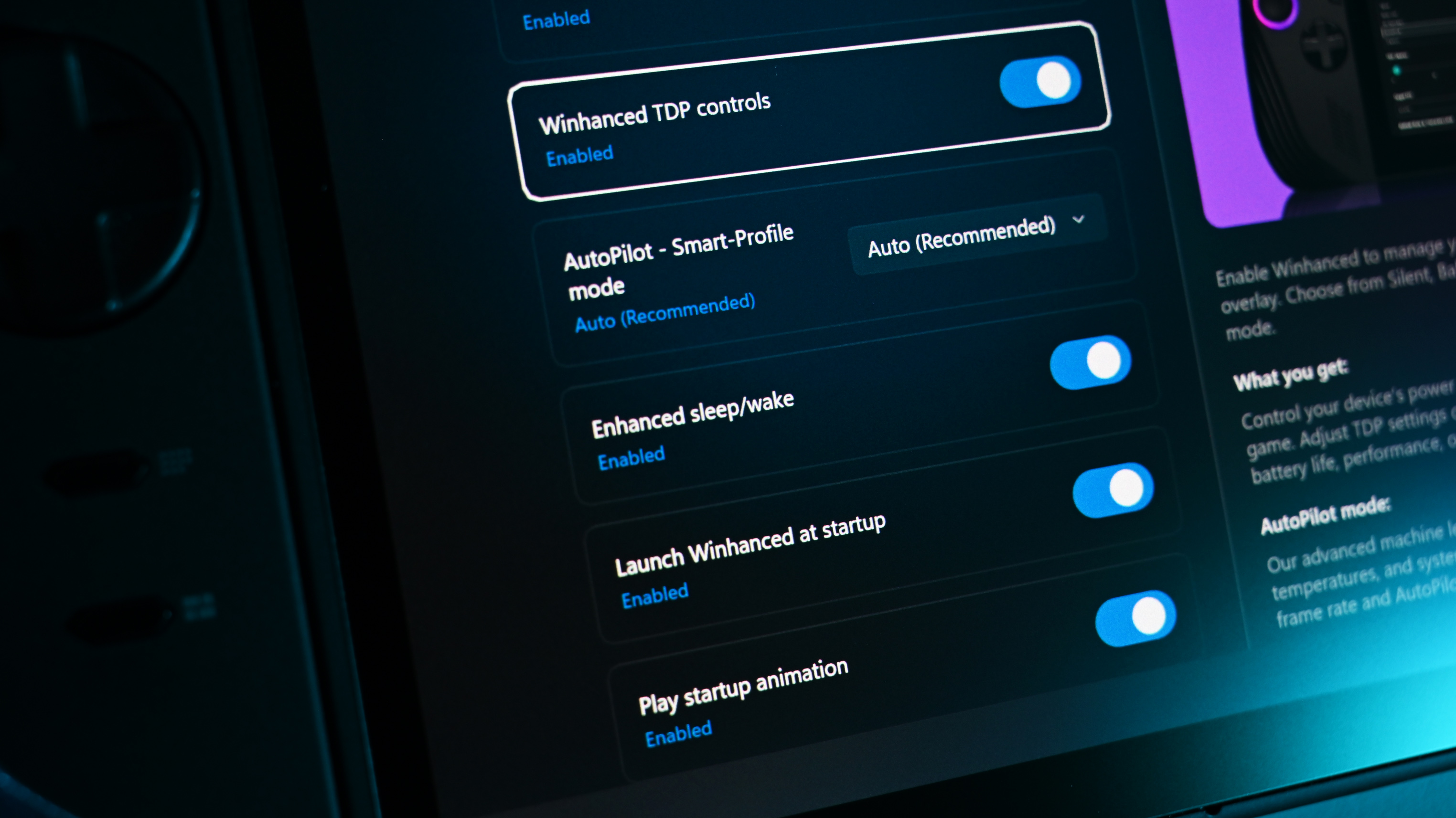Close-up of a Lenovo Legion Go 2 screen, running WinHanced, showing a settings menu with options like "WinHanced TDP controls" enabled. The interface is sleek and modern.