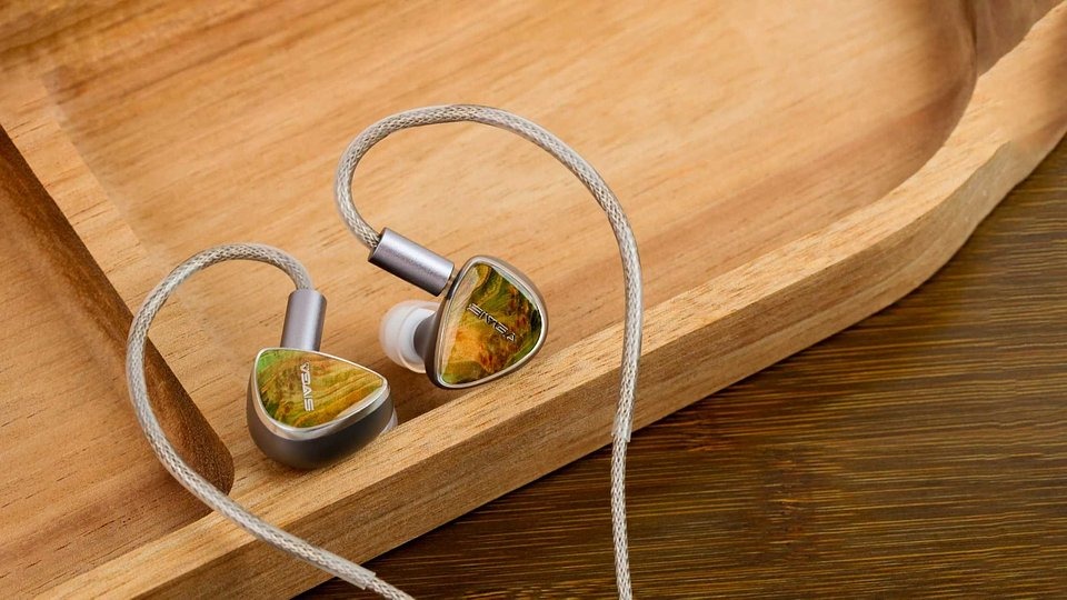 Sivga Lyrebird wired earbuds on a wooden surface