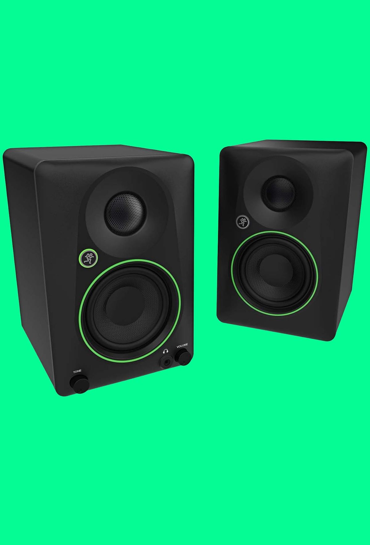 Mackie CR3.5 BT speakers on a green background