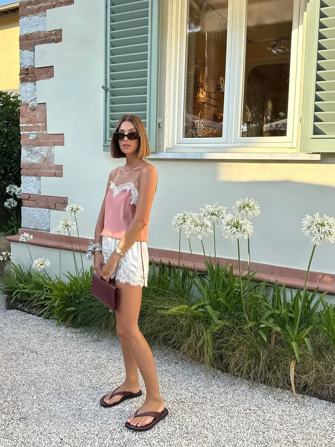 Woman in lace trim top and shorts