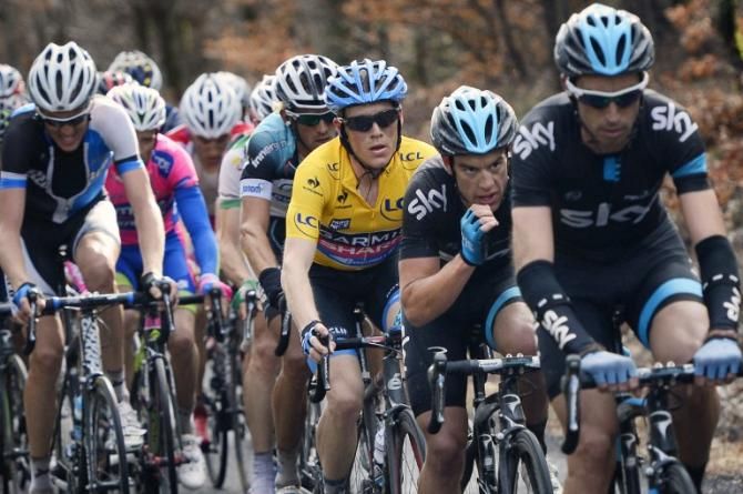 Race leader Andrew Talansky sits behind the Team Sky train
