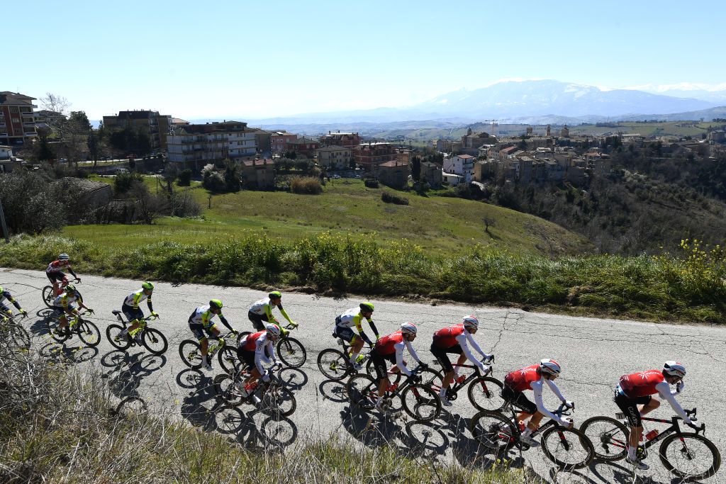 SAN BENEDETTO DEL TRONTO ITALY MARCH 13 Benjamin Thomas of France Davide Cimolai of Italy Victor Lafay of France Anthony Perez of France Davide Villella of Italy and Team Cofidis and a general view of the Peloton passing through Offida Village 292m during the 57th TirrenoAdriatico 2022 Stage 7 a 159km stage from San Benedetto del Tronto to San Benedetto del Tronto TirrenoAdriatico WorldTour on March 13 2022 in San Benedetto del Tronto Italy Photo by Tim de WaeleGetty Images
