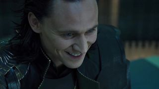 Loki smiling during Hulk&#039;s rampage in The Avengers