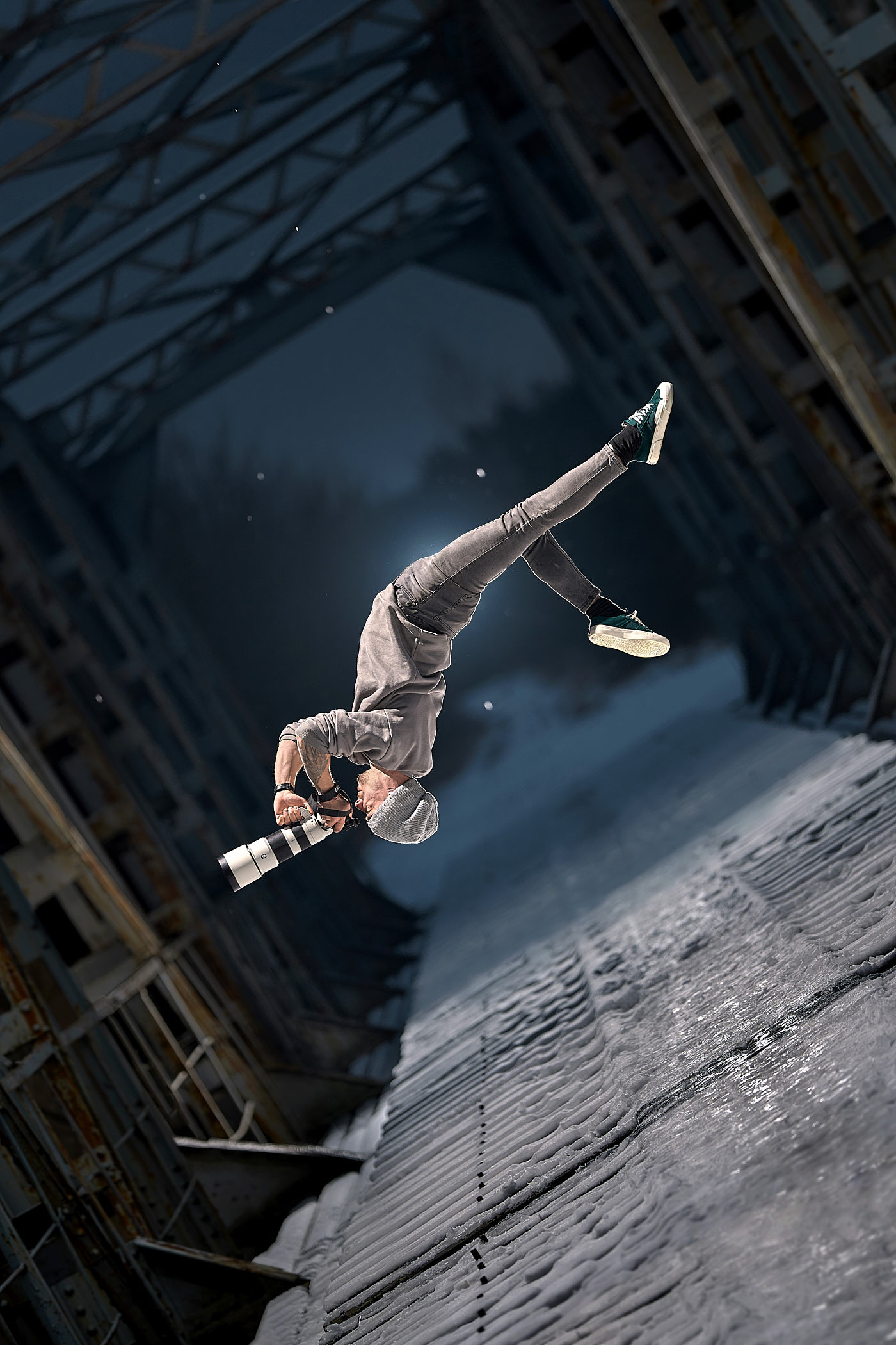 A photograph of Volodya Voronin doing parkour with a camera in hand